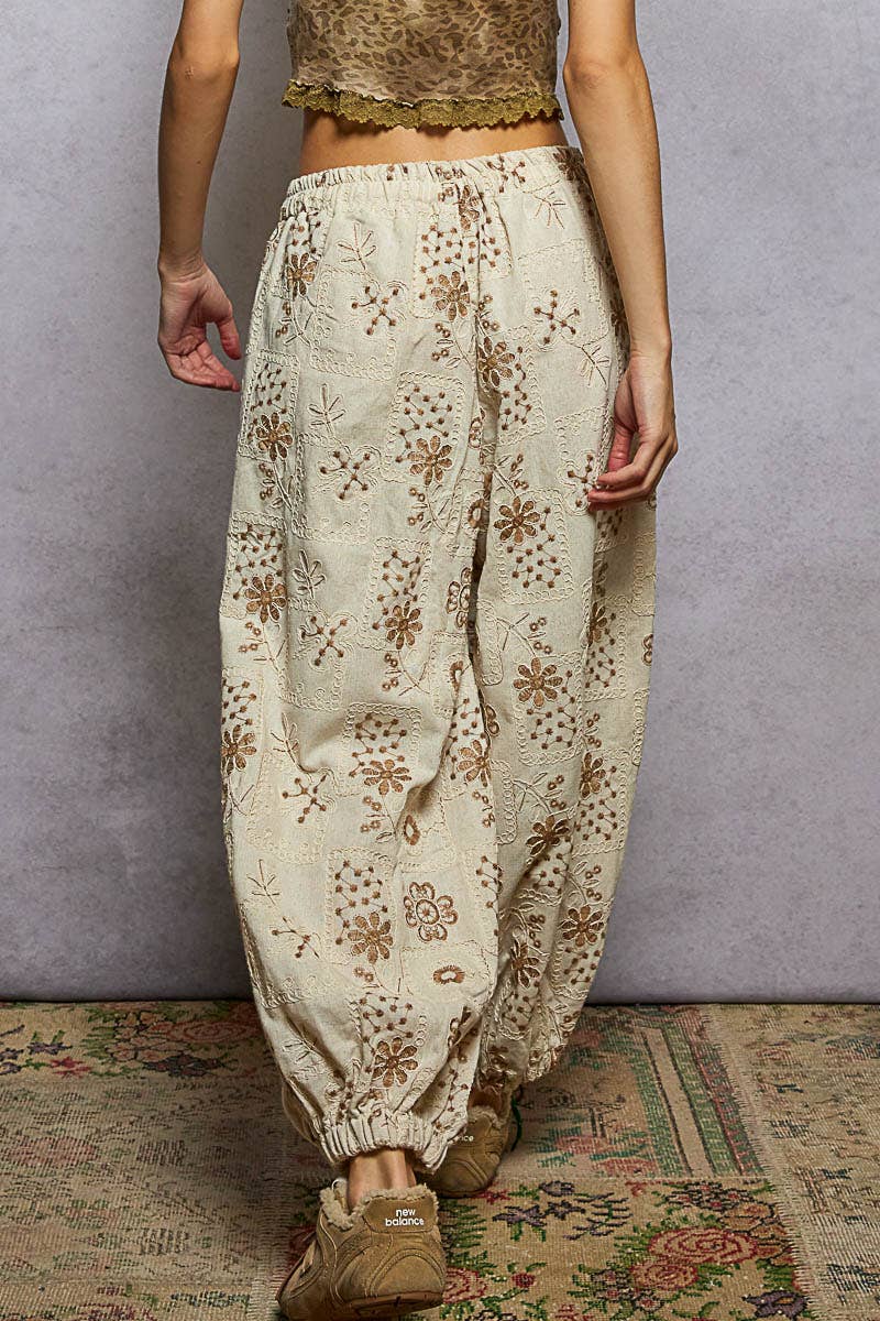 Floral embroidery quilted jogger pants