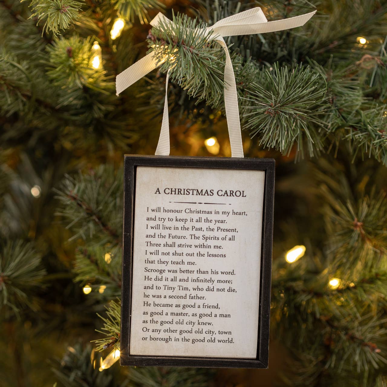 A CHRISTMAS CAROL SIGN ORNAMENT