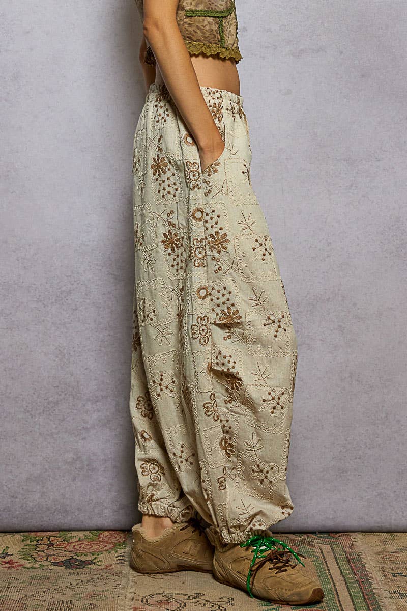 Floral embroidery quilted jogger pants
