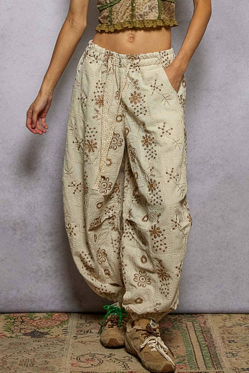 Floral embroidery quilted jogger pants